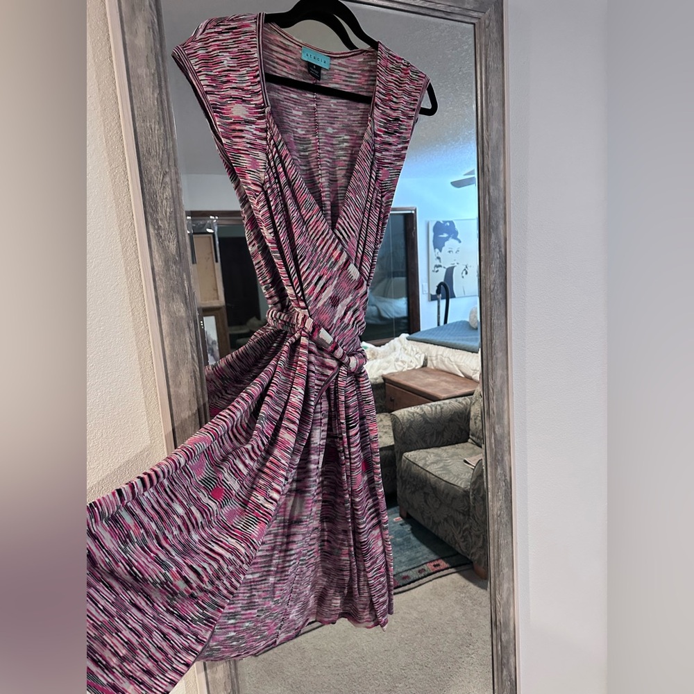 Wrap dress only worn once. This material is amazing!!!